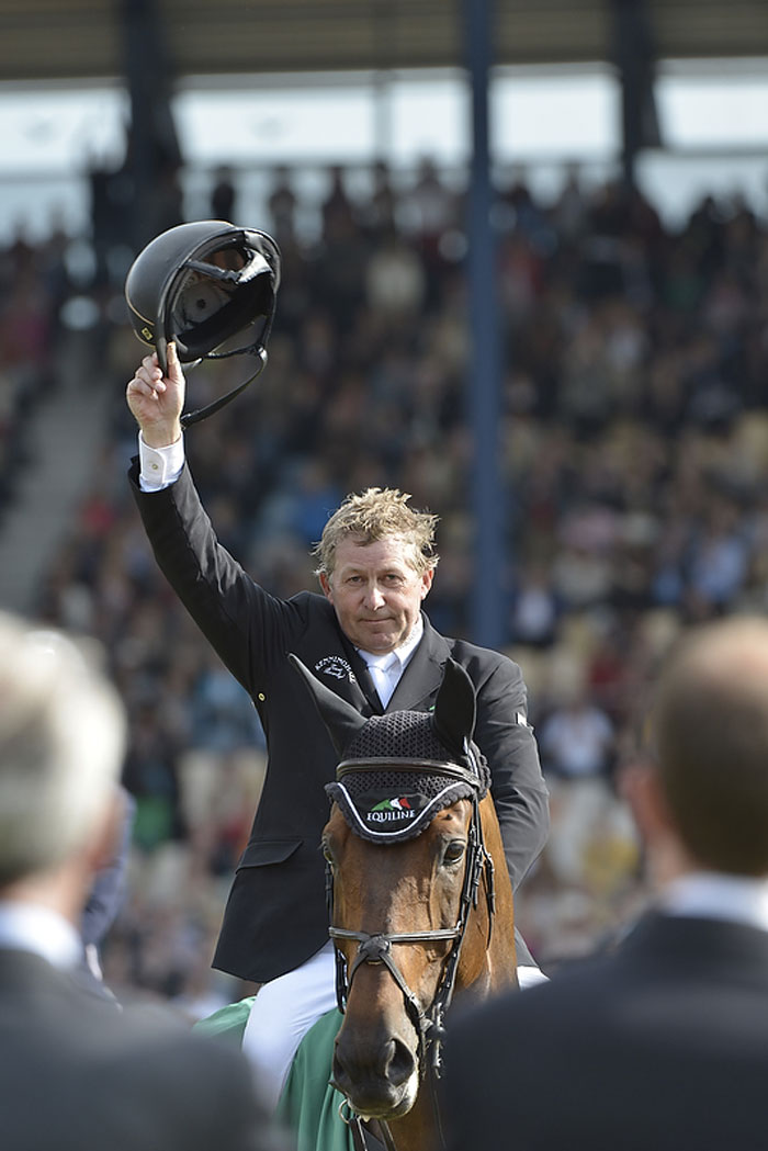 nick skelton, famoso jinete británico con el caballo big star ganando el gran premio Rolex